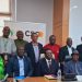 Group photo of the delegation of the Pan-African Farmers' Organization (PAFO), led by its president, Ibrahima Coulibaly (seated, third from the right), with Martin Fregene, Director of the Agriculture and Agro-Industry Department at the African Development Bank (seated, third from the left)